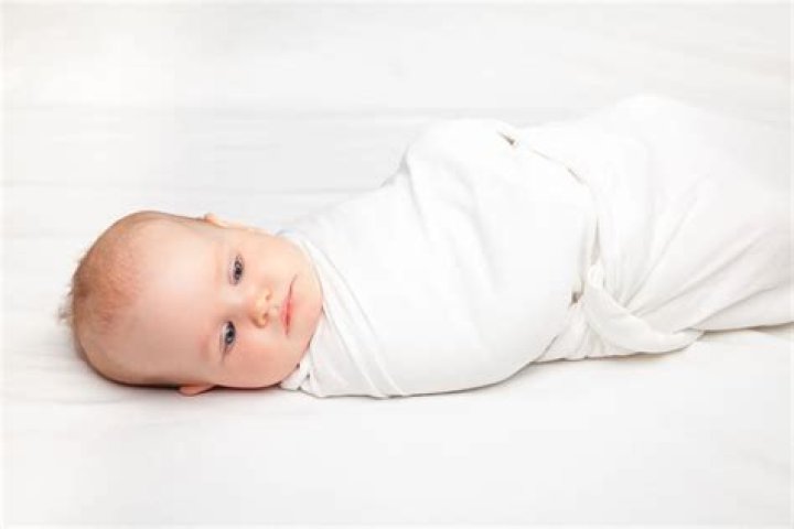 Is it okay for my newborn to sleep unswaddled?