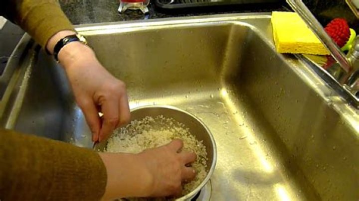 What does cleaning rice do?