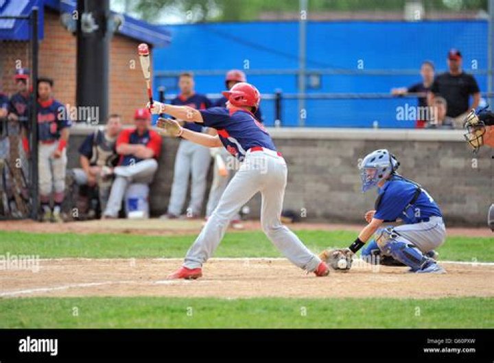 When a baseball player swings and misses the ball?