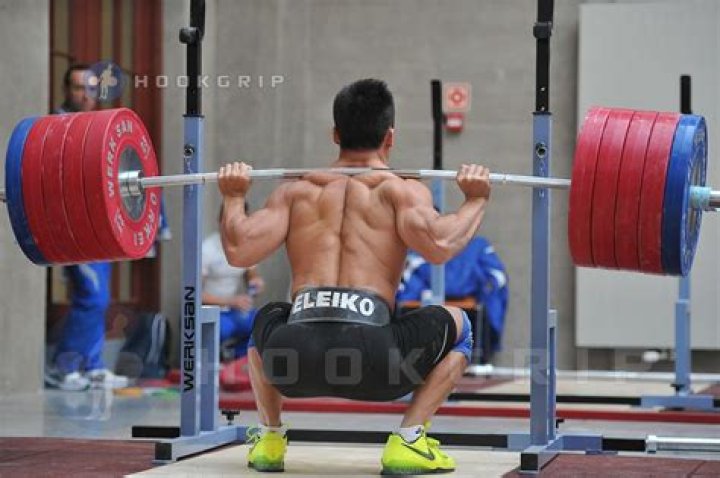 When to breathe when squatting?