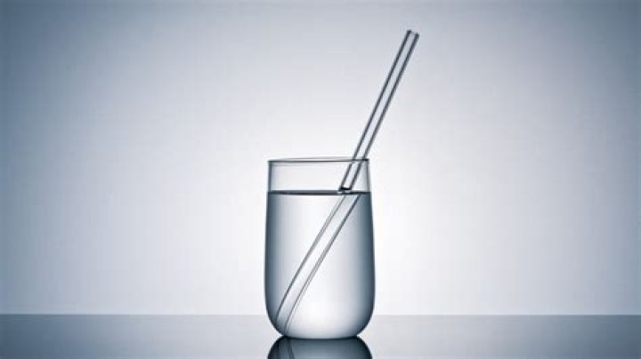 Why does a straw appear to bend in water?